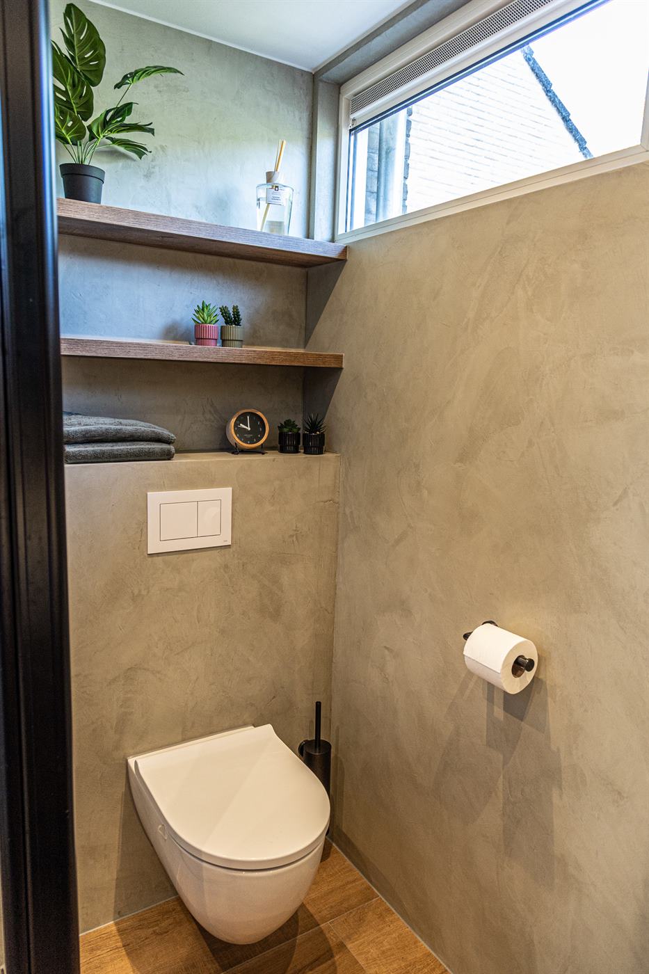 Toilet afgewerkt met beton ciré